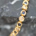 Pulsera Rivier Toix oro amarillo brillantes y zafiros